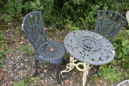 A GREY AND CREAM PAINTED ALUMINIUM THREE PIECE BISTRO SET, comprising a circular table, with pierced
