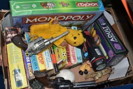 A BOX OF ASSORTED BOXED PUZZLES, BOARD GAMES, PUPPETS AND TOYS, including Monopoly Wizard of Oz,
