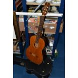 AN EPIPHONE ACOUSTIC GUITAR, with a hard case, solid cedar top, mahogany back and sides, missing