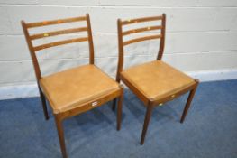 A PAIR OF MID CENTURY TEAK CHAIRS (condition report: seat pad worn) (2)