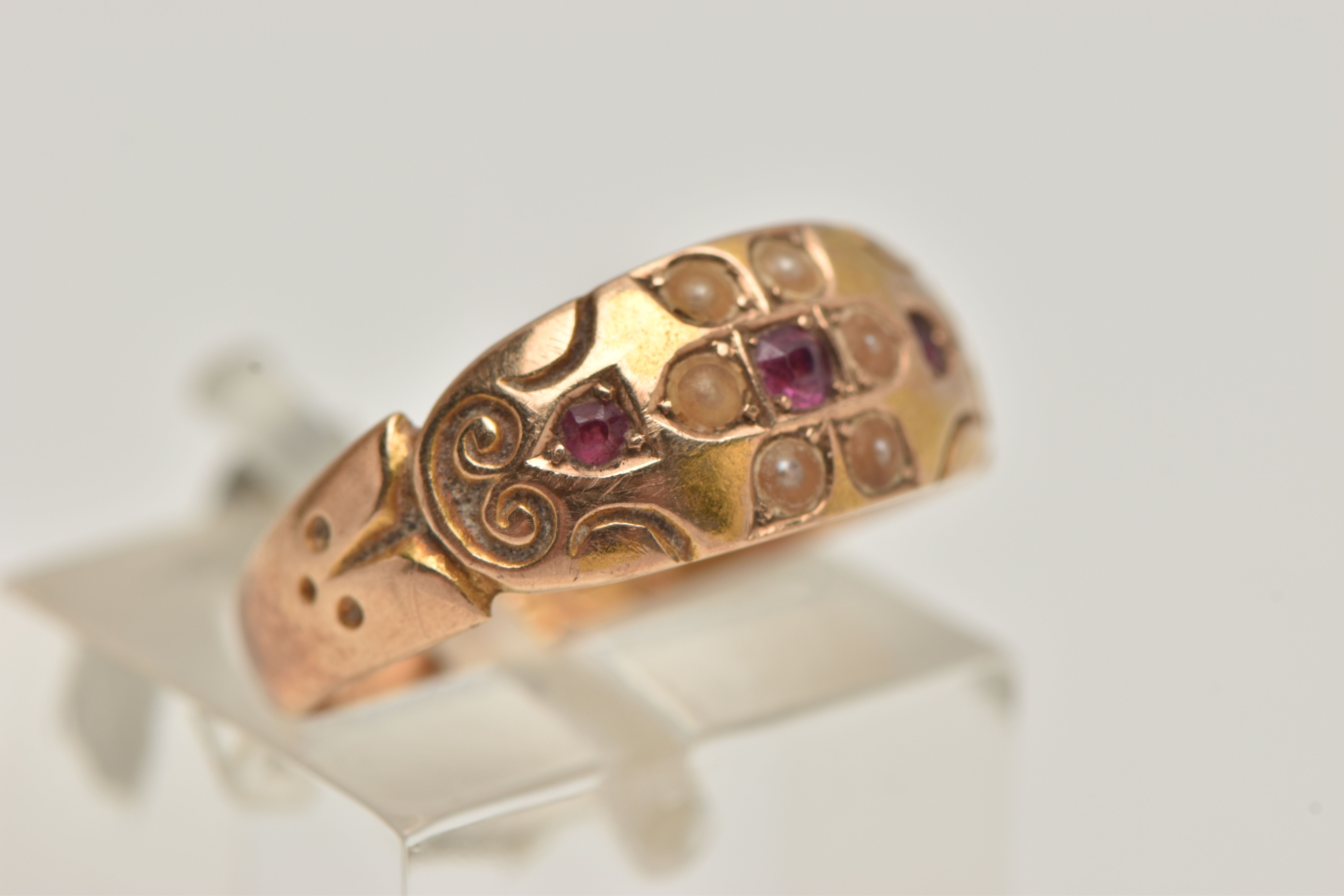 A LATE VICTORIAN 15CT GOLD RUBY AND PEARL RING, flower detail to the centre set with a central - Image 4 of 4
