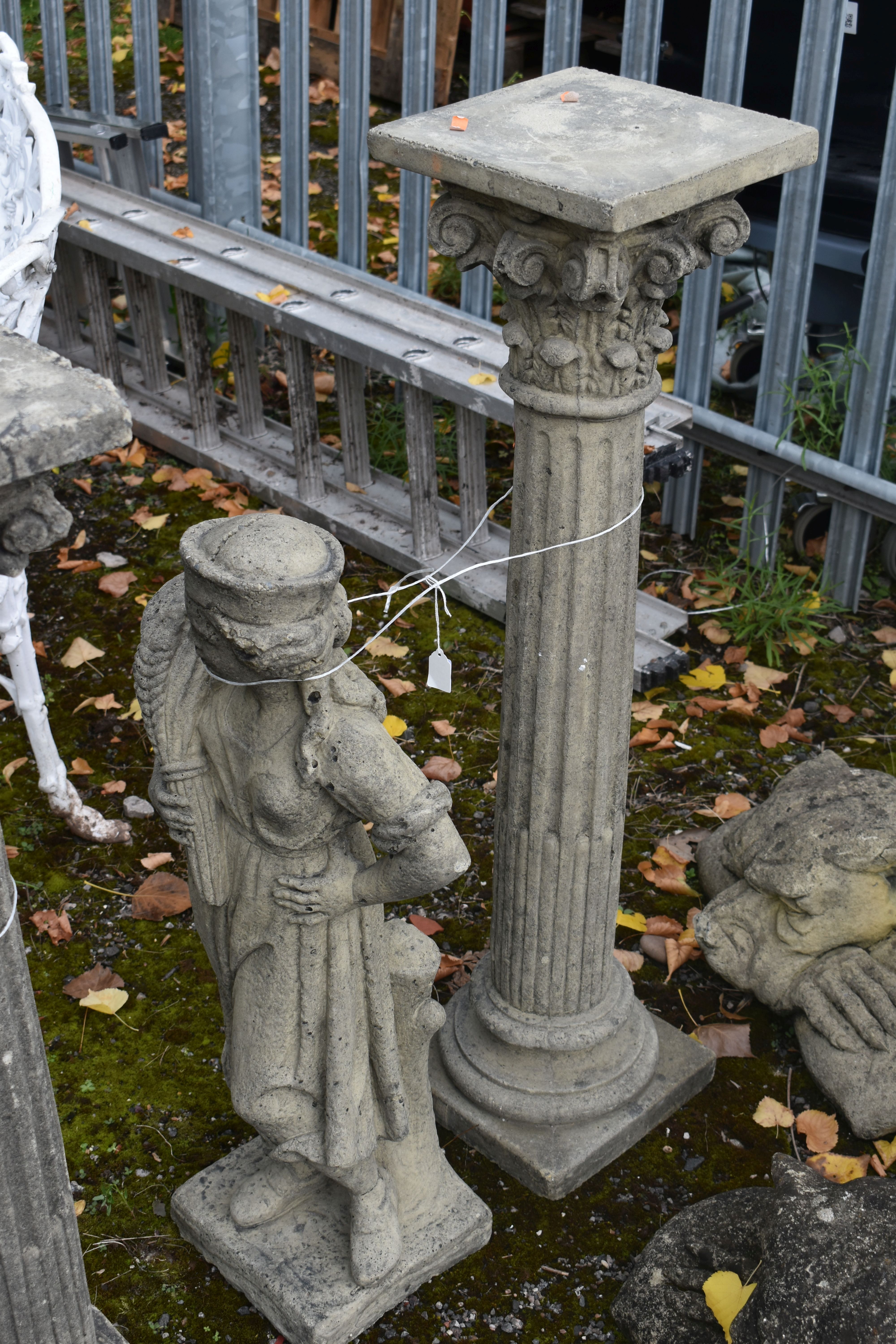 A COMPOSITE FIGURE OF A GIRL CARRYING WHEAT, with a Corinthian style pillar, maximum height 179cm