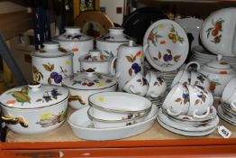 A LARGE QUANTITY OF ROYAL WORCESTER EVESHAM AND EVESHAM GOLD DINNERWARE, comprising four large