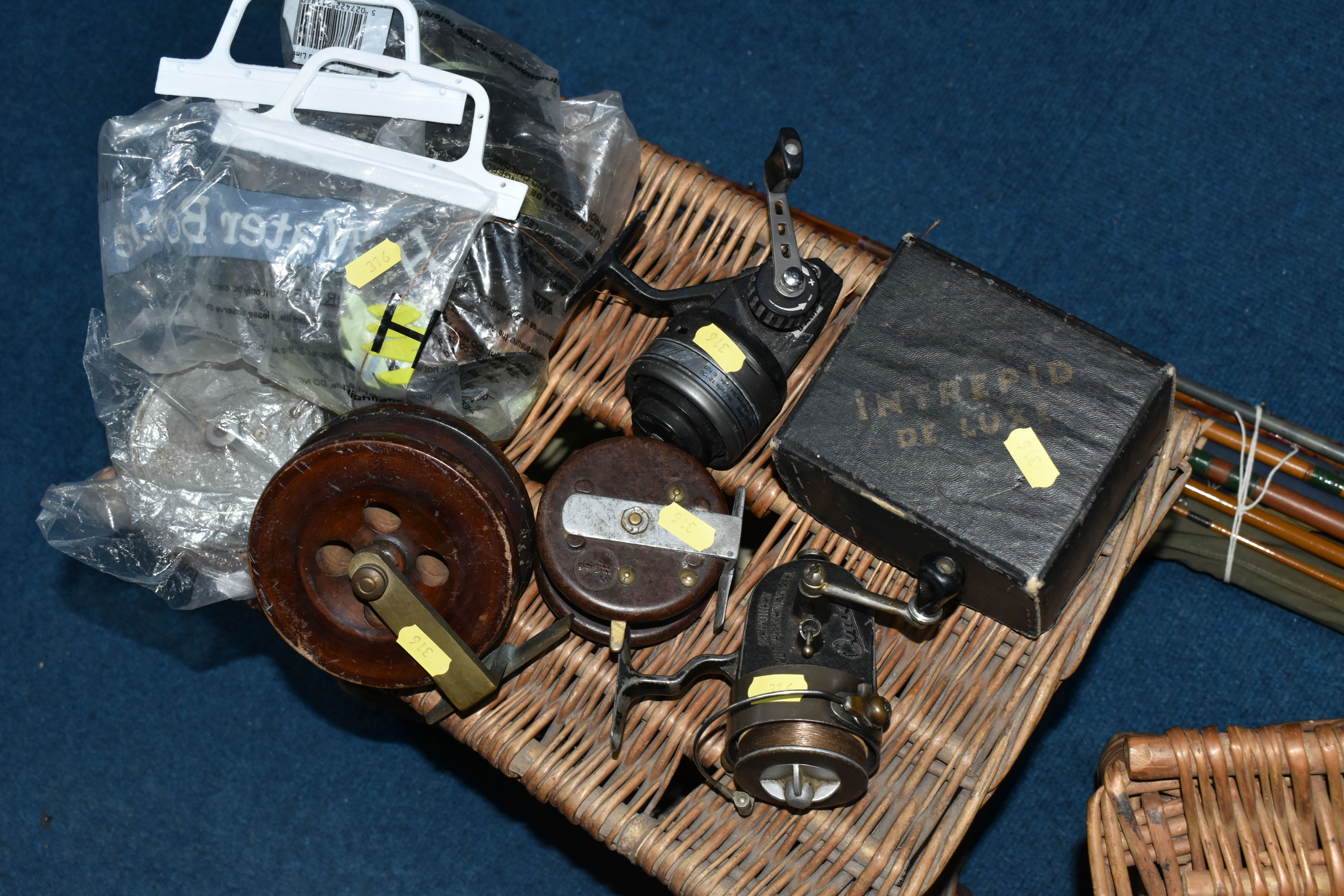 TWO WICKER FISHING BASKETS AND A GROUP OF VINTAGE FISHING RODS AND REELS, comprising two hinged - Image 3 of 6