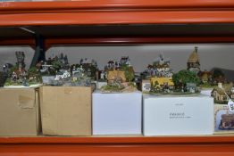A GROUP OF FOURTEEN BOXED DANBURY MINT COTTAGE SCULPTURES, comprising The Country Village Collection