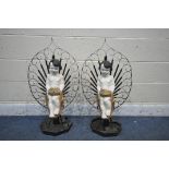 A PAIR OF MID 20TH CENTURY WROUGHT IRON AND PAINTED PLASTIC DECORATIVE FIGURAL ORNAMENTS, the