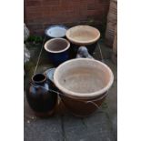 A SELECTION OF GARDEN PLANT POTS, to include a brown glazed plant pot, with bamboo decoration,