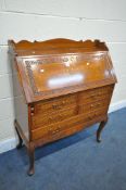 AN ORIENTAL HARDWOOD AND BRASS INLAID BUREAU, with a fitted interior, over five drawers, on cabriole