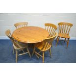 A MODERN PINE CIRCULAR PEDESTAL TABLE, diameter 106cm x height 73cm, and a five beech kitchen chairs