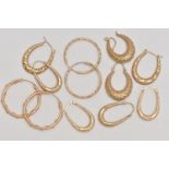 AN ASSORTMENT OF YELLOW METAL CREOLE AND HOOP EARRINGS, to include four pairs of creole hoop