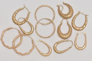 AN ASSORTMENT OF YELLOW METAL CREOLE AND HOOP EARRINGS, to include four pairs of creole hoop