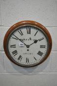 A 19TH CENTURY MAPLE AND CO LTD OF LONDON SINGLE FUSEE WALL CLOCK, in a walnut case with a glazed