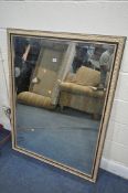 A LARGE MODERN GILT FRAMED BEVELLED EDGE WALL MIRROR, 134cm x 103cm (condition report: good)