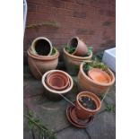 A SELECTION OF PLANT POTS, to include eight terracotta pots, three glazed pots, etc (condition - all