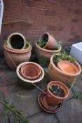 A SELECTION OF PLANT POTS, to include eight terracotta pots, three glazed pots, etc (condition - all