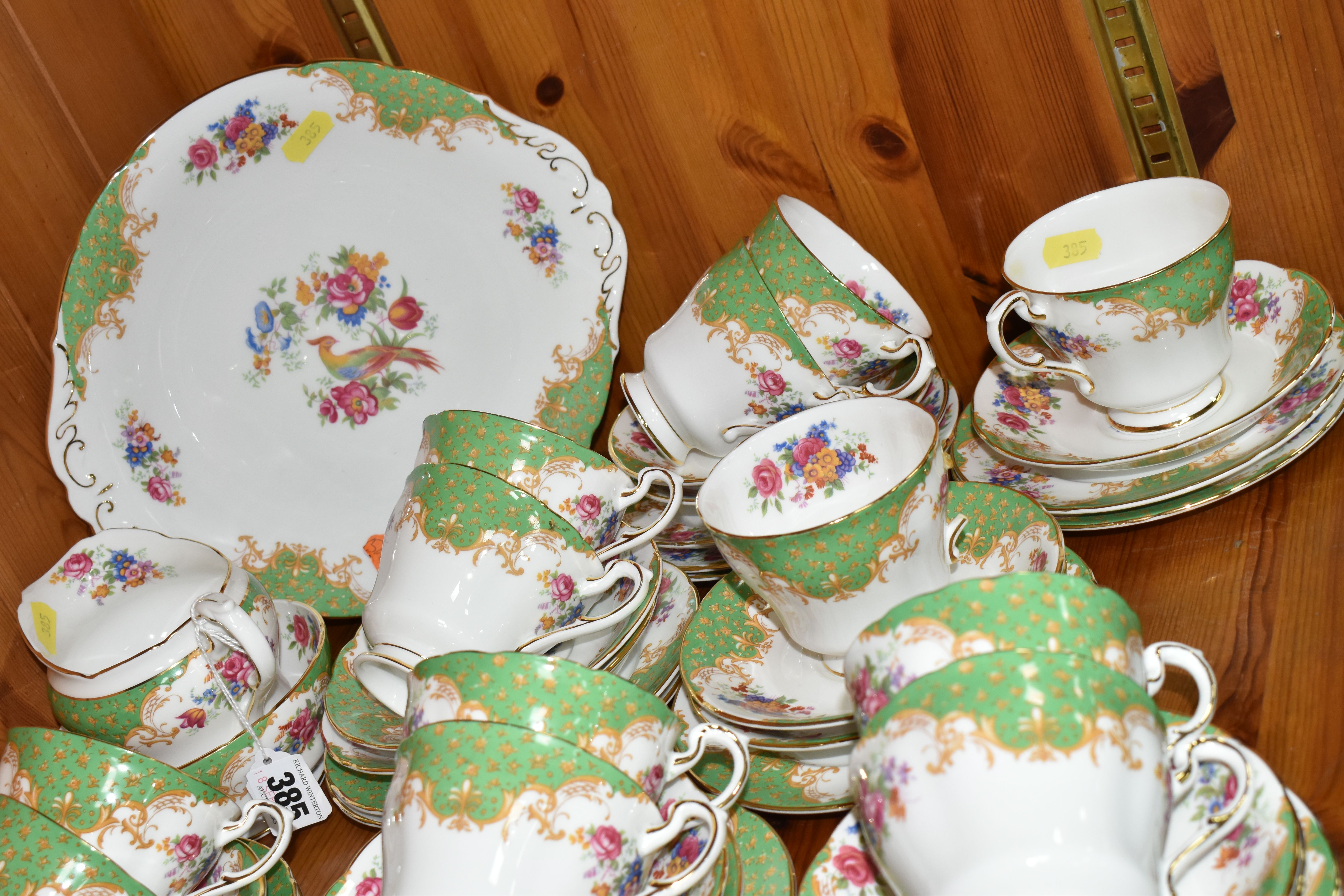 A PARAGON 'ROCKINGHAM' PATTERN TEA SET, comprising a cake plate, milk jug, twelve cups, twelve - Image 2 of 4