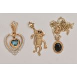 THREE 9CT GOLD GEM SET PENDANTS, the first designed as a monkey, an open work heart pendant, and