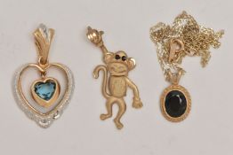 THREE 9CT GOLD GEM SET PENDANTS, the first designed as a monkey, an open work heart pendant, and