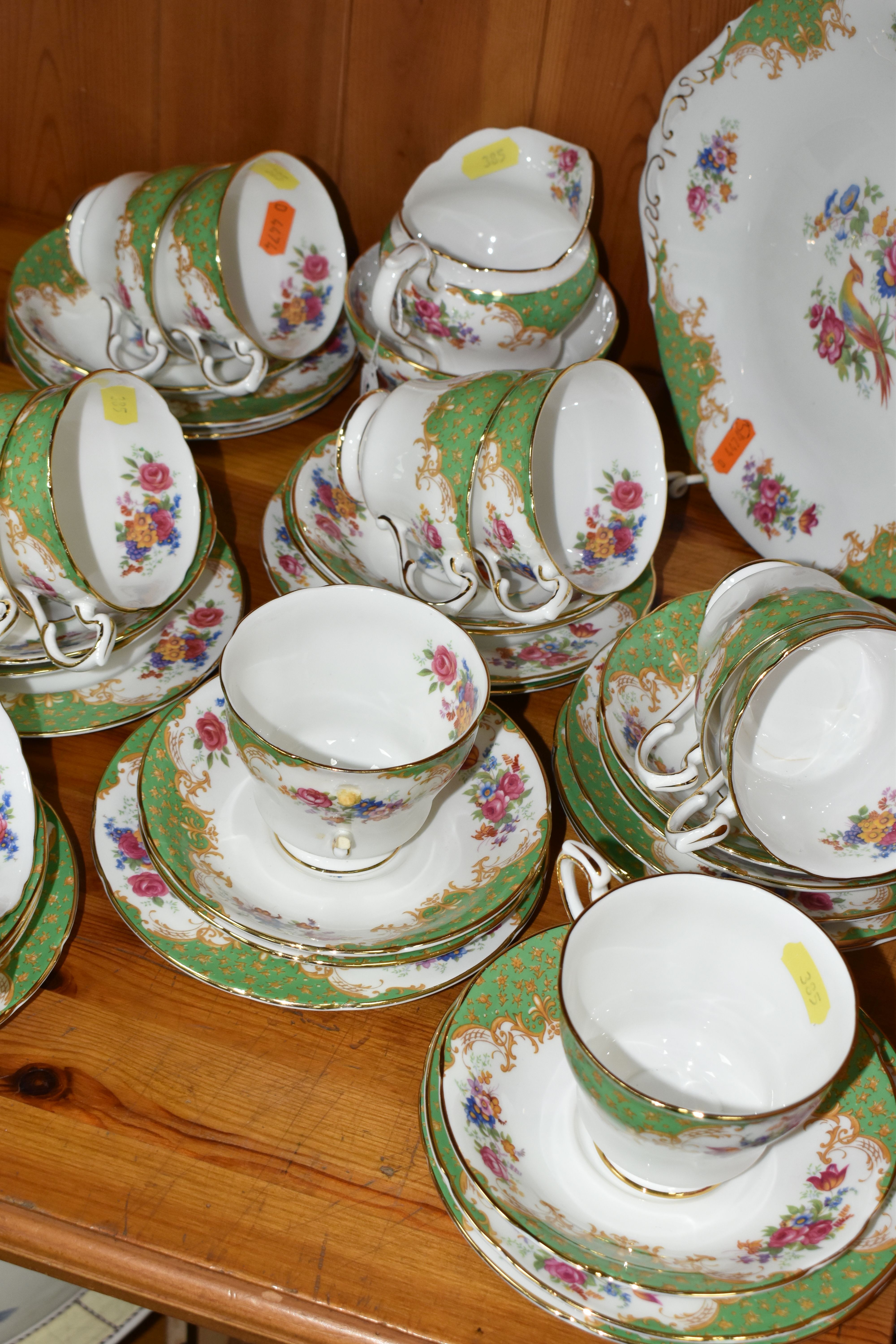 A PARAGON 'ROCKINGHAM' PATTERN TEA SET, comprising a cake plate, milk jug, twelve cups, twelve - Image 4 of 4