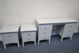 A MARKS AND SPENCERS GREY BEDROOM SUITE, comprising a dressing table with six drawers, width 137cm x