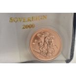 A FULL SOVEREIGN COIN, 2000 George and the Dragon, Elizabeth II, encased in plastic casing