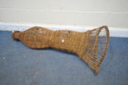 A WICKER EEL TRAP, length 120cm (condition report: one corner detached)