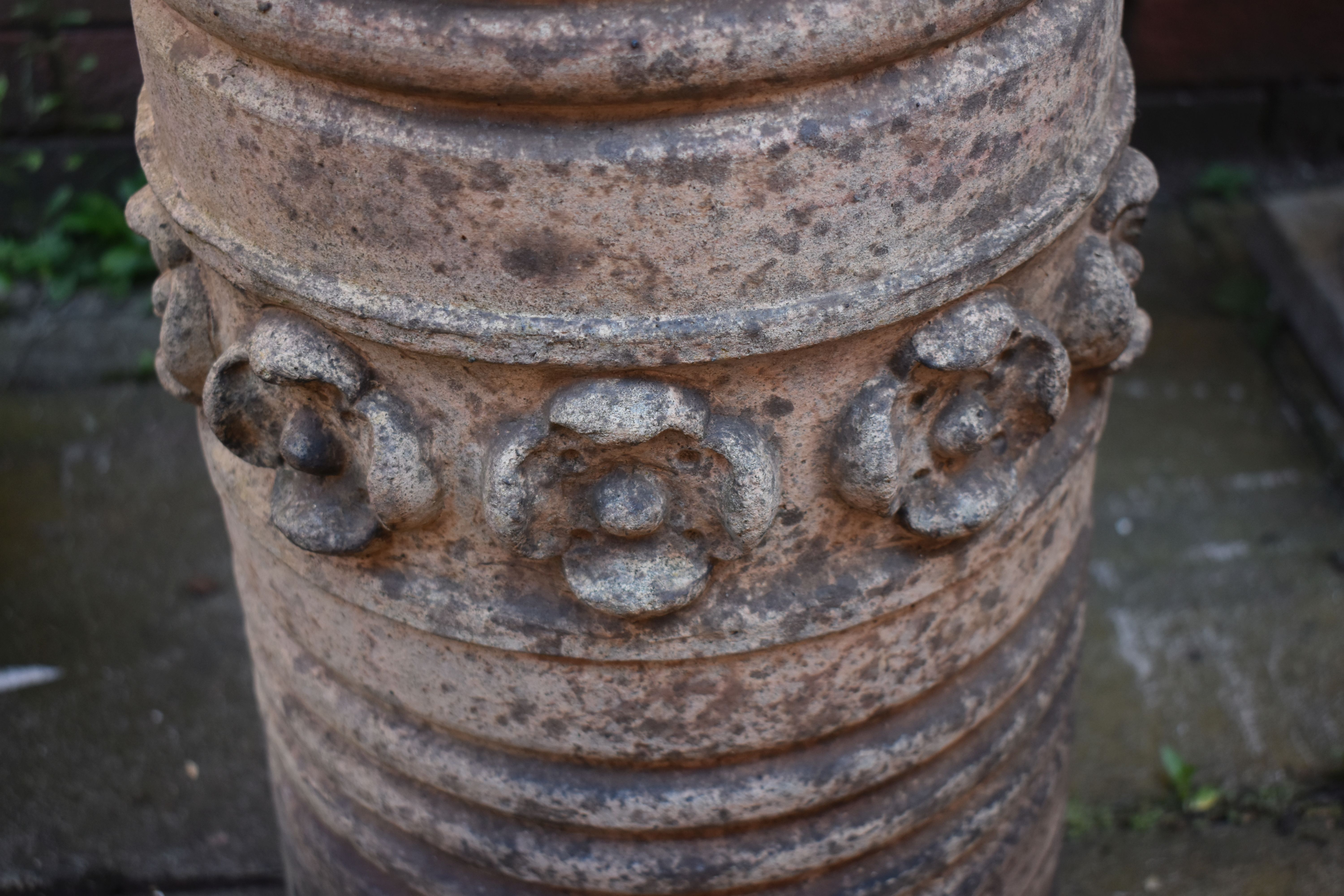 A PAIR OF TERRACOTTA CYLINDRICAL TAPERED CHIMNEYS, with central floral decoration, height 52cm ( - Image 3 of 5