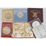 A BAG OF COINS, to include a cased 'Festival Of Britain 1951 Crown' coin, a cased 'Bailiwick Of