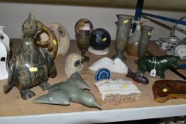 A COLLECTION OF STONE ITEMS, to include three carved Canadian birds, a jug and goblet, two vases