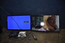 A LINSAR 32in TV with remote, a Logik 32in TV and remote and a wall bracket (non have stands) (