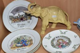 SIX ROYAL DOULTON AND ROYAL WORCESTER CHRISTMAS PLATES, AND AN ELEPHANT FIGURE, comprising Royal
