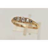 A FIVE STONE DIAMOND RING, yellow metal ring, set with five old cut diamonds, approximate total