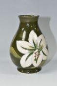 A MOORCROFT POTTERY 'BERMUDA LILY' PATTERN VASE, of baluster form, with tube lined white lilies on a