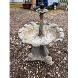 A SMALL LEAD WATER FEATURE, with a shell shaped bath, on a mythical creature base,