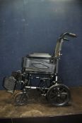 A REMPLOY FOLDING WHEELCHAIR with two footrests but no cushion
