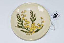 A MOORCROFT POTTERY 'WATTLE' PATTERN PIN DISH, with tube lined yellow flowers on a cream blue