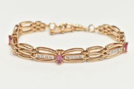 A 9CT GOLD DIAMOND AND RUBY BRACELET, a gate and brick link style bracelet, set with twenty single