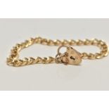 A 9CT GOLD CURB LINK BRACELET, fitted with a heart padlock clasp, hallmarked 9ct Birmingham,