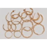 AN ASSORTMENT OF YELLOW METAL HOOP EARRINGS, to include four pairs of hollow earrings with sleeper