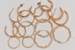 AN ASSORTMENT OF YELLOW METAL HOOP EARRINGS, to include four pairs of hollow earrings with sleeper