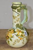 A LATE NINETEENTH CENTURY DOULTON LAMBETH FAIENCE EWER, with green handle in the form of a dragon,