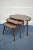 A MID CENTURY ERCOL PEBBLE NEST OF THREE TABLES, width 66cm x depth 44cm x height 40cm (condition