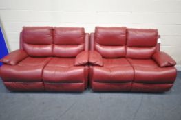 A RED LEATHER TWO PIECE RECLINING LOUNGE SUITE, comprising of two two seater settee, one electric