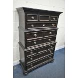A TALL MAHOGANY CHEST ON CHEST EFFECT OF SEVEN DRAWERS, with turned handles, on bun feet, width