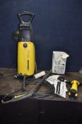 A KARCHER 720 MAX PRESSURE WASHER with lance, brush and rotary brush heads and a Karcher Window