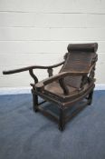 A JAPANESE ROSEWOOD PLANTATION CHAIR / MOONGAZING CHAIR, carved bonsai tree to circular headrests,