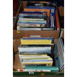 TWO BOXES OF BOOKS containing approximately fifty titles in hardback and paperback formats on the