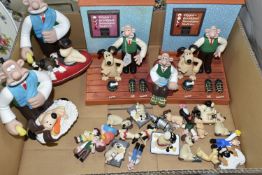 A BOX OF WALLACE AND GROMIT COLLECTABLES, to include two Wesco alarm clocks (untested, sd),