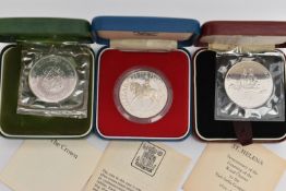 THREE CASED COINS, to include a Proof commemorative coin of the Queens Silver Jubilee 1977 coin, a