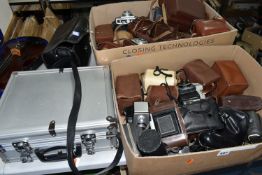 A QUANTITY OF CAMERAS IN TWO BOXES AND TWO CASES, including a cased Fujica ST605N fitted with a